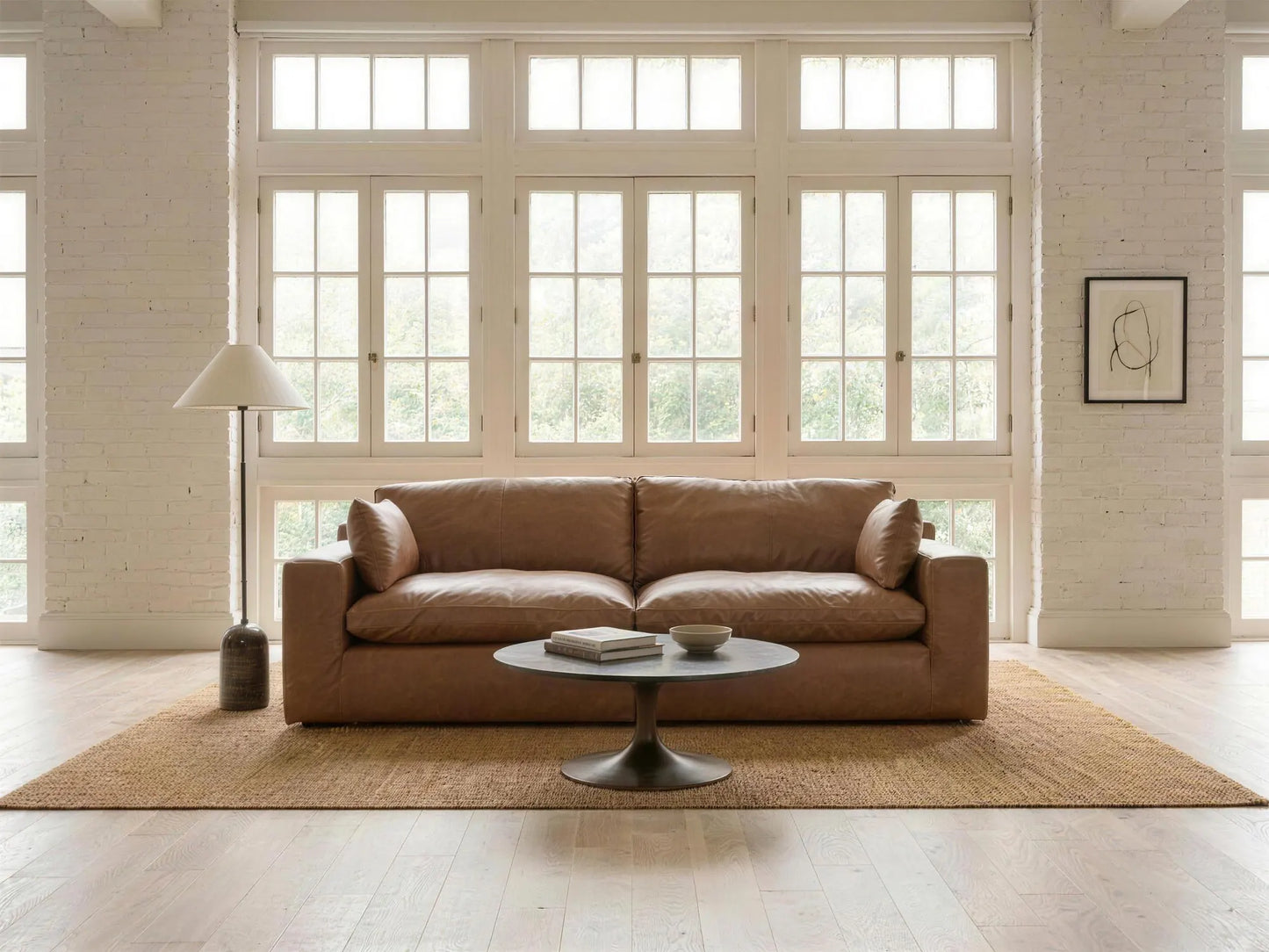 Emilia 2-Piece Loveseat in caramel top-grain leather, styled in a living room