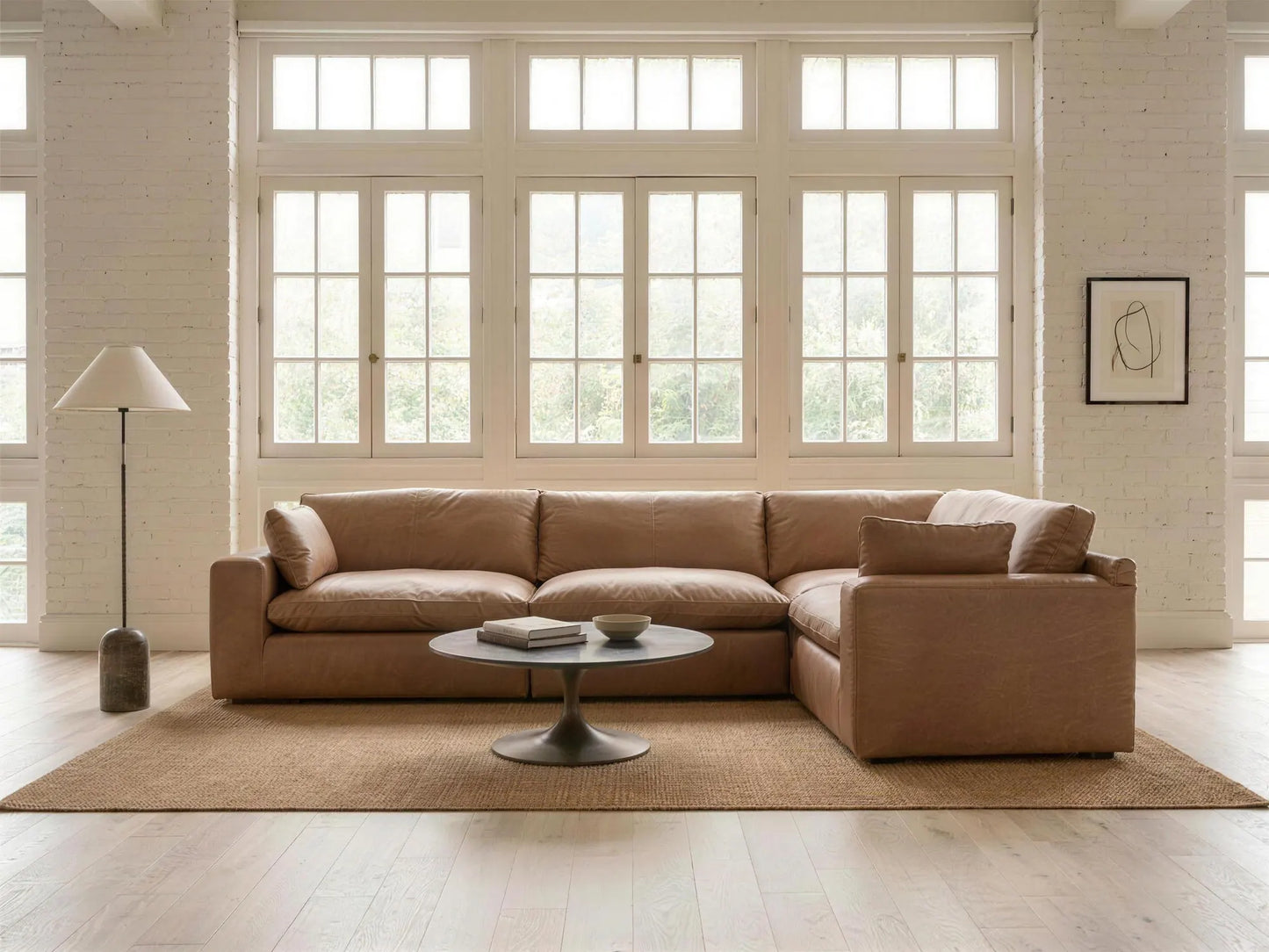 Emilia 4-Piece L-Shape Sectional in caramel top-grain leather, styled in a living room