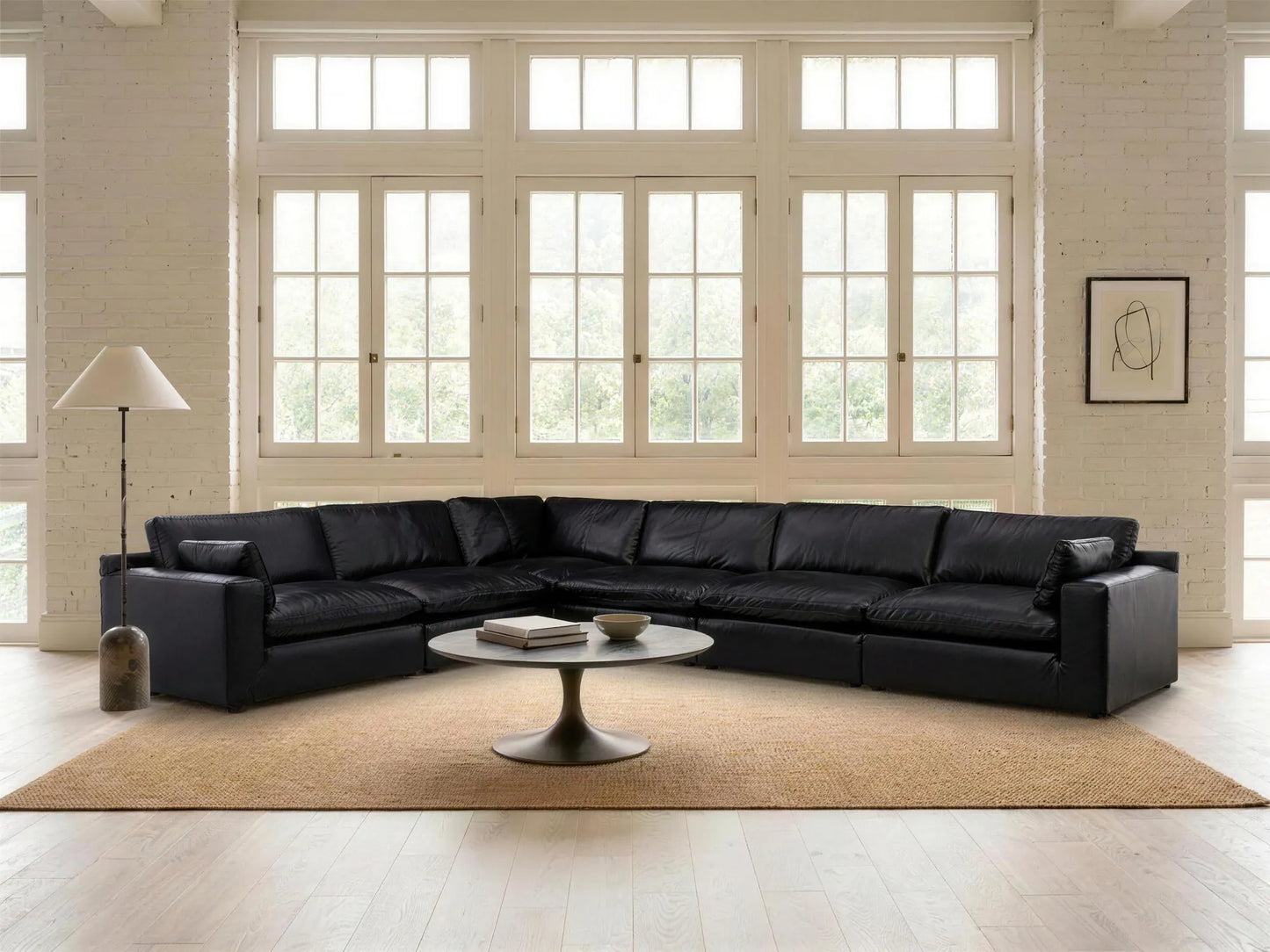 Emilia 6-Piece L-Shape Sectional in black top-grain leather, styled in a living room