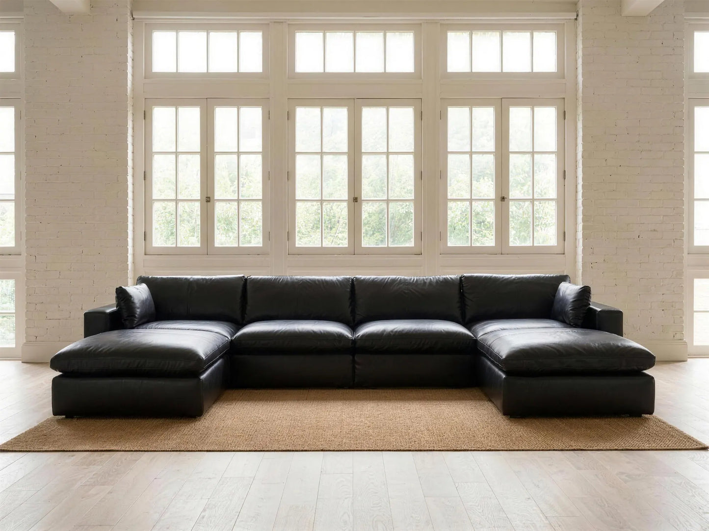 Emilia 6-Piece U-Shape Sectional in black top-grain leather, styled in a living room