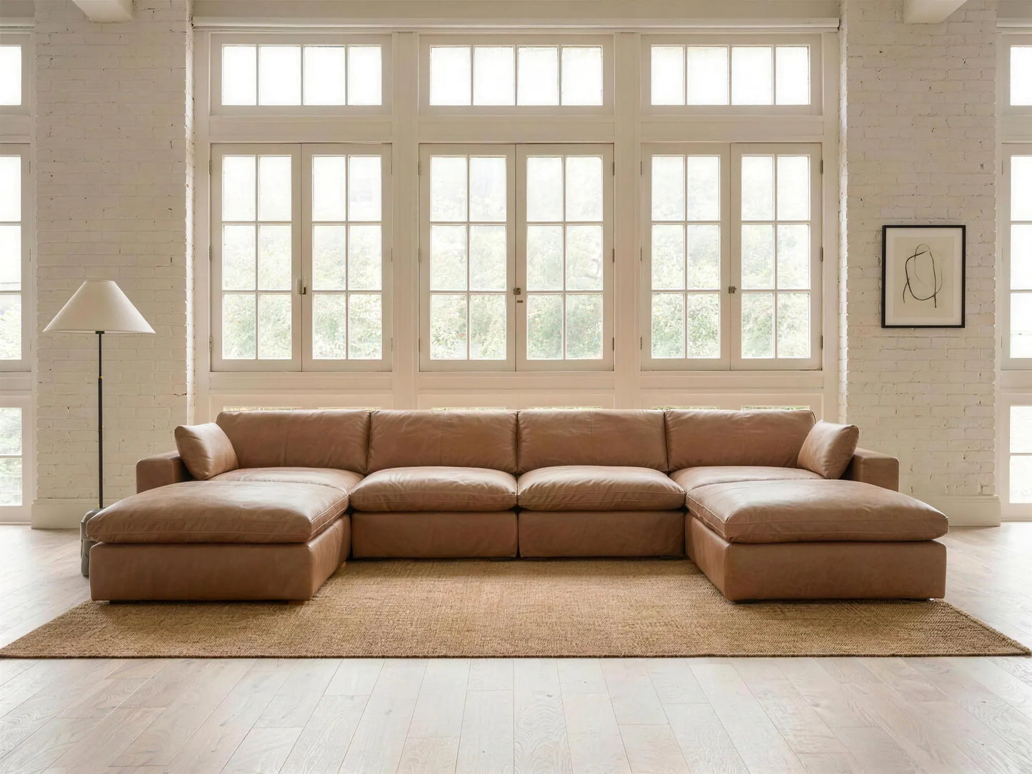 Emilia 6-Piece U-Shape Sectional in caramel top-grain leather, styled in a living room