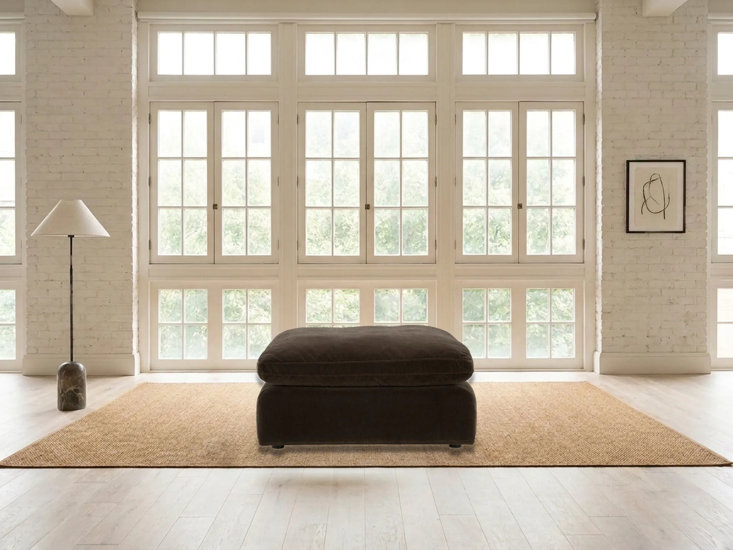 Rowan Oversized Velvet Ottoman in Espresso in a living room
