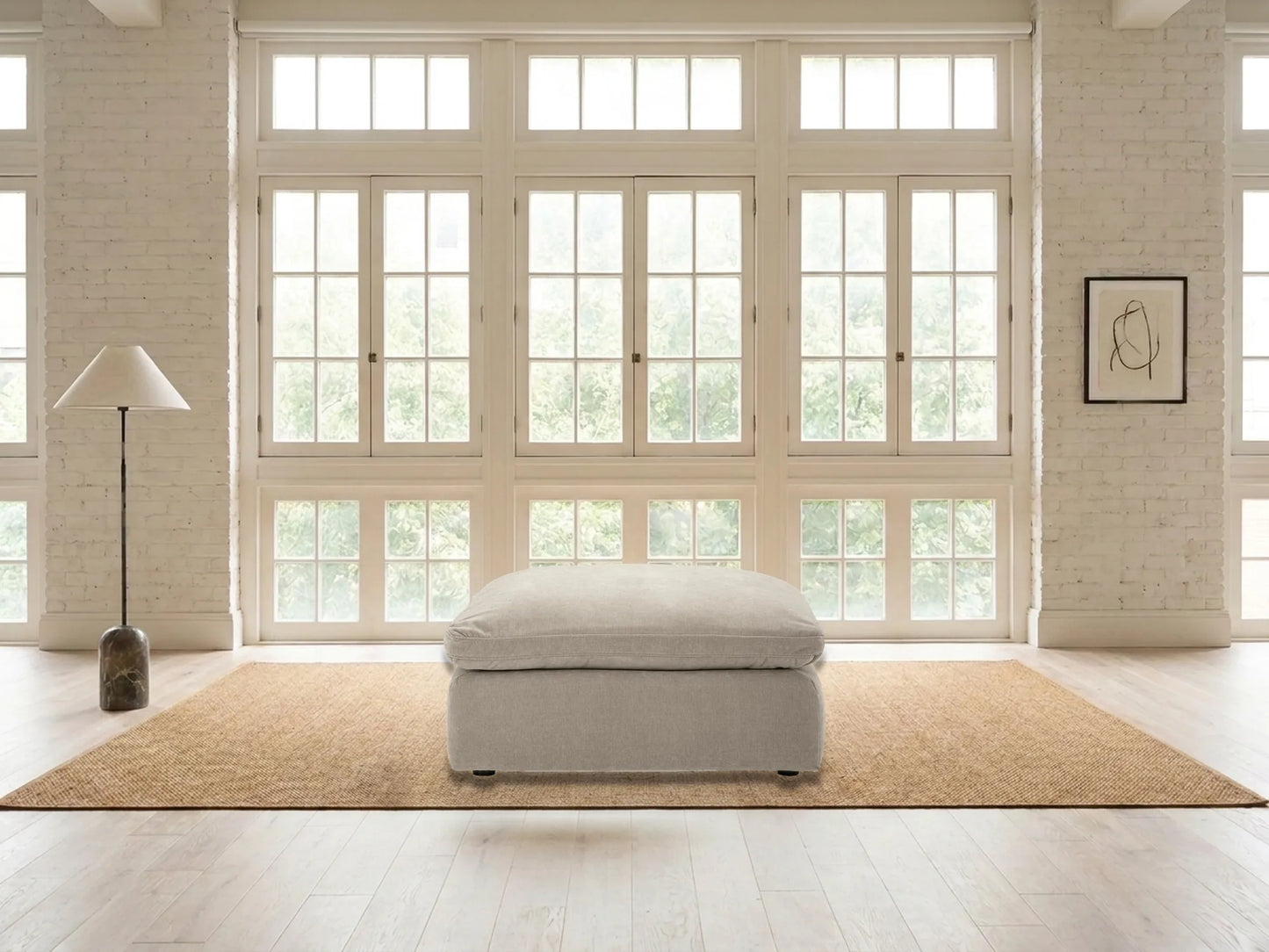 Rowan Oversized Velvet Ottoman in Oatmeal in a living room